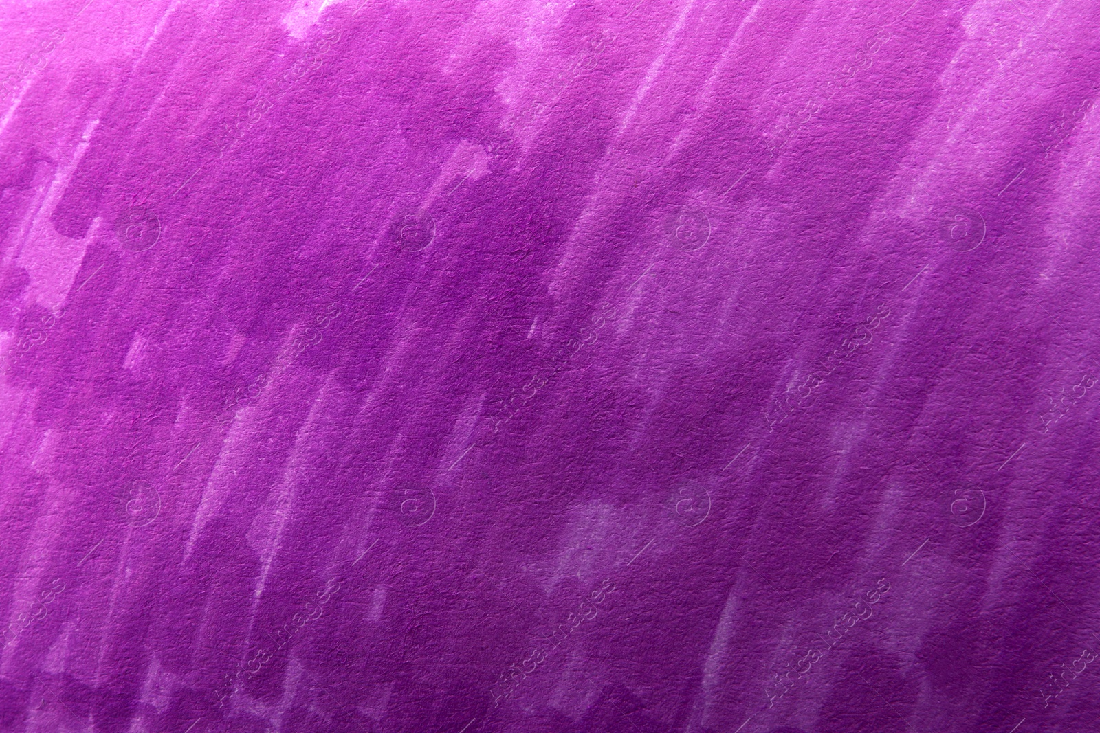 Photo of Abstract painting drawn with violet marker as background, top view
