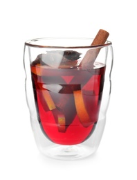 Photo of Glass of mulled wine with spices isolated on white