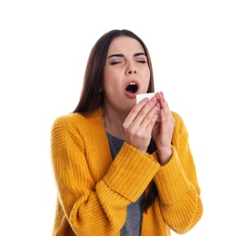 Beautiful young woman coughing against white background