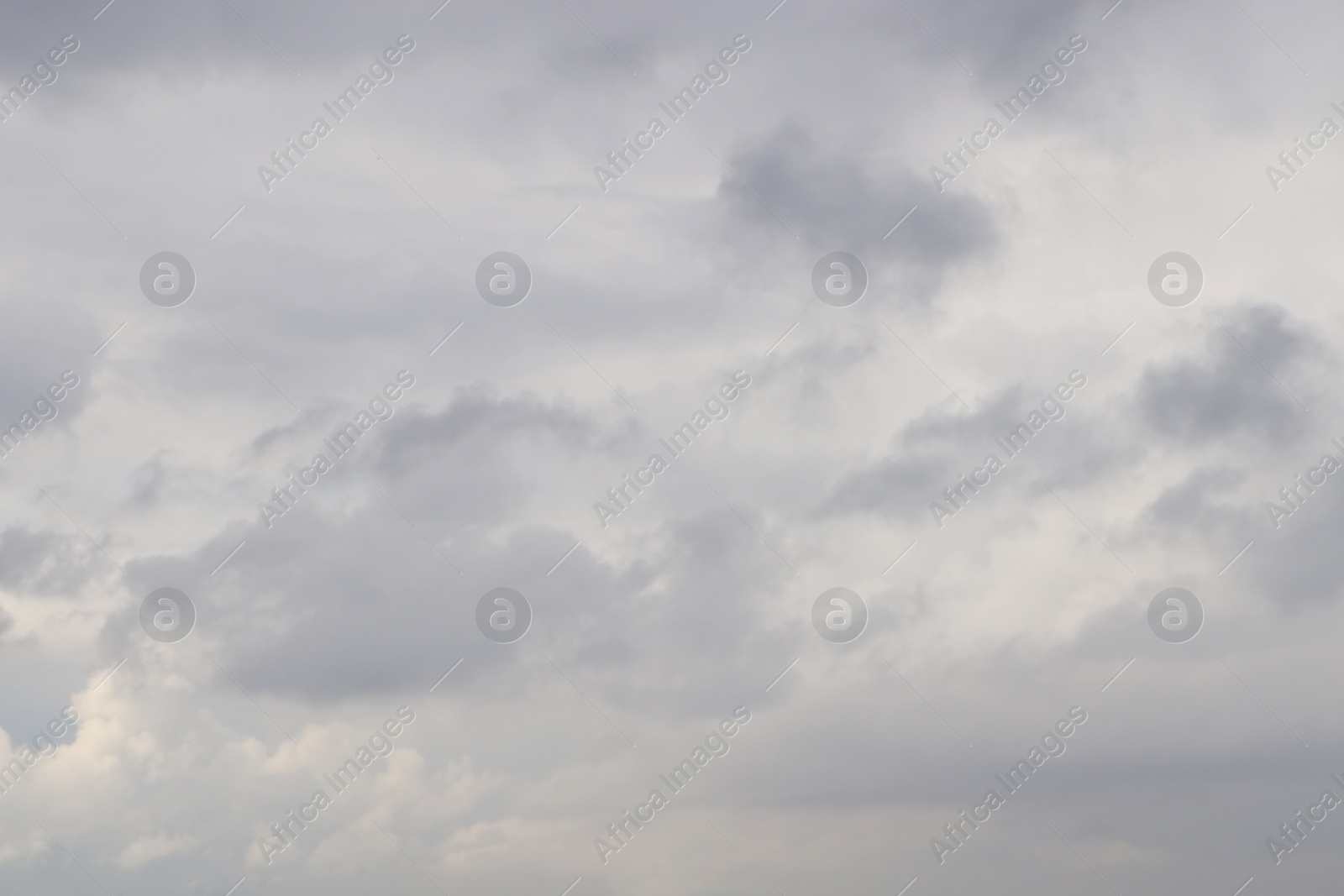 Photo of Sky with heavy rainy clouds on grey day