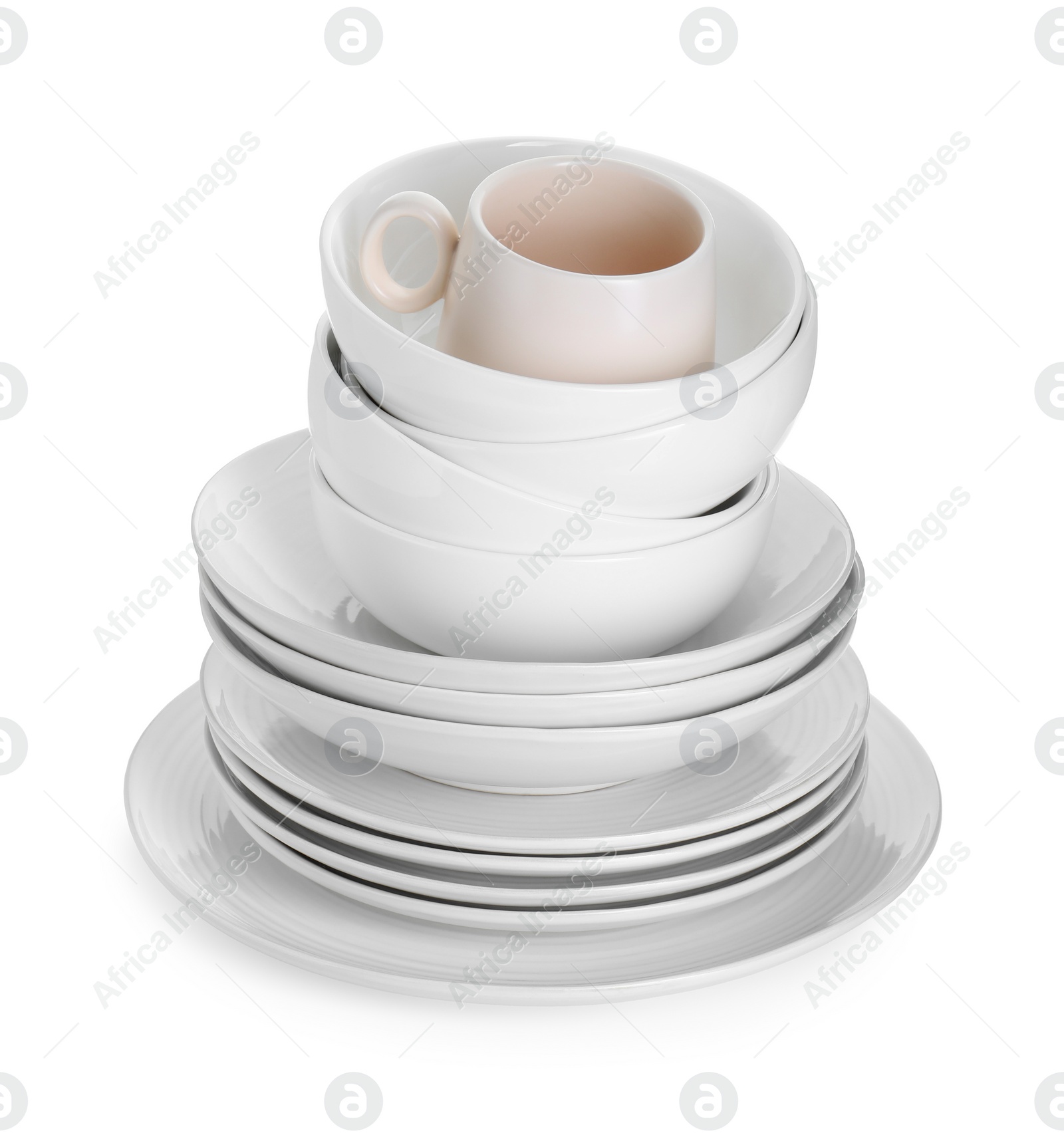 Photo of Beautiful ceramic plates, bowls and cup isolated on white