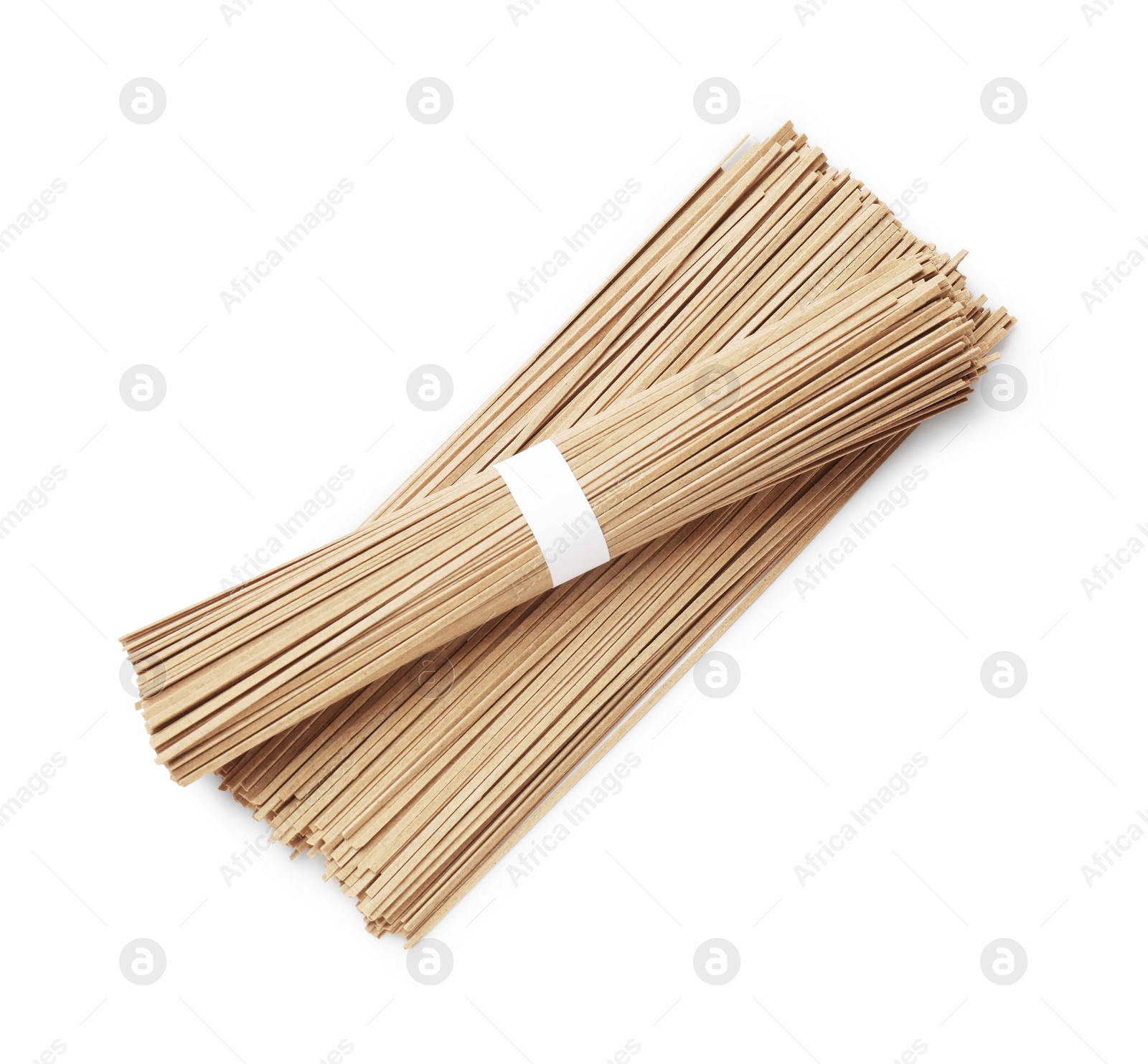 Photo of Uncooked buckwheat noodles (soba) isolated on white, top view