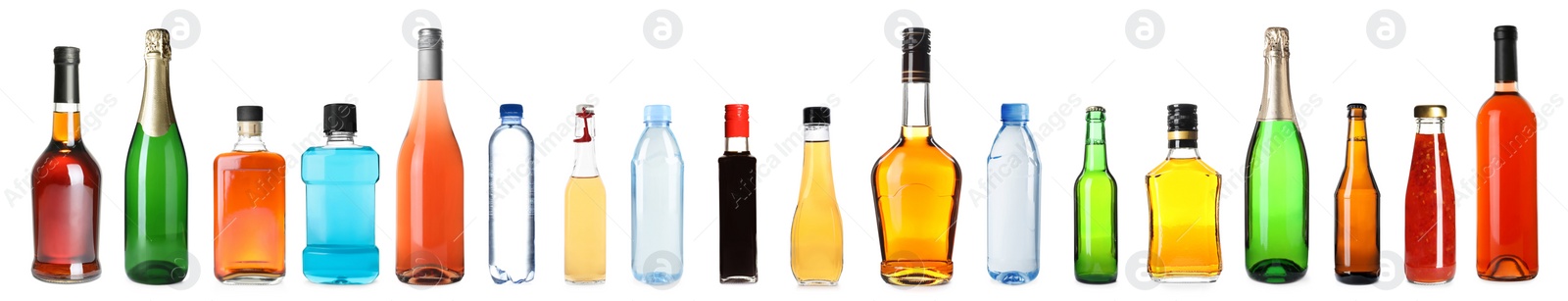 Image of Set of bottles with different liquids on white background. Banner design