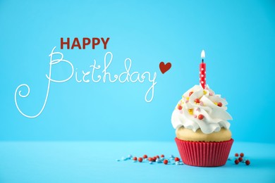 Image of Happy Birthday! Delicious cupcake with candle on light blue background
