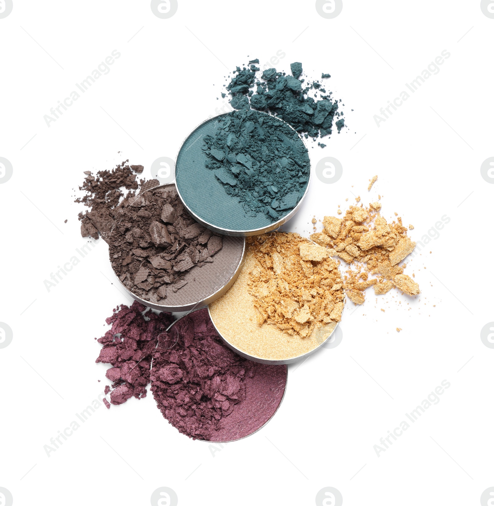 Photo of Different crushed eye shadows on white background, flat lay. Professional makeup product