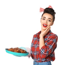 Photo of Funny young housewife with homemade pastry on white background