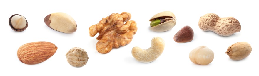 Set with different tasty nuts on white background. Banner design