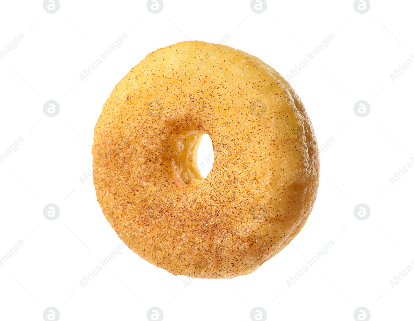 Photo of Sweet tasty glazed donut with cinnamon powder isolated on white