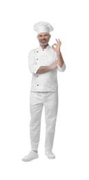 Photo of Happy chef in uniform showing OK gesture on white background