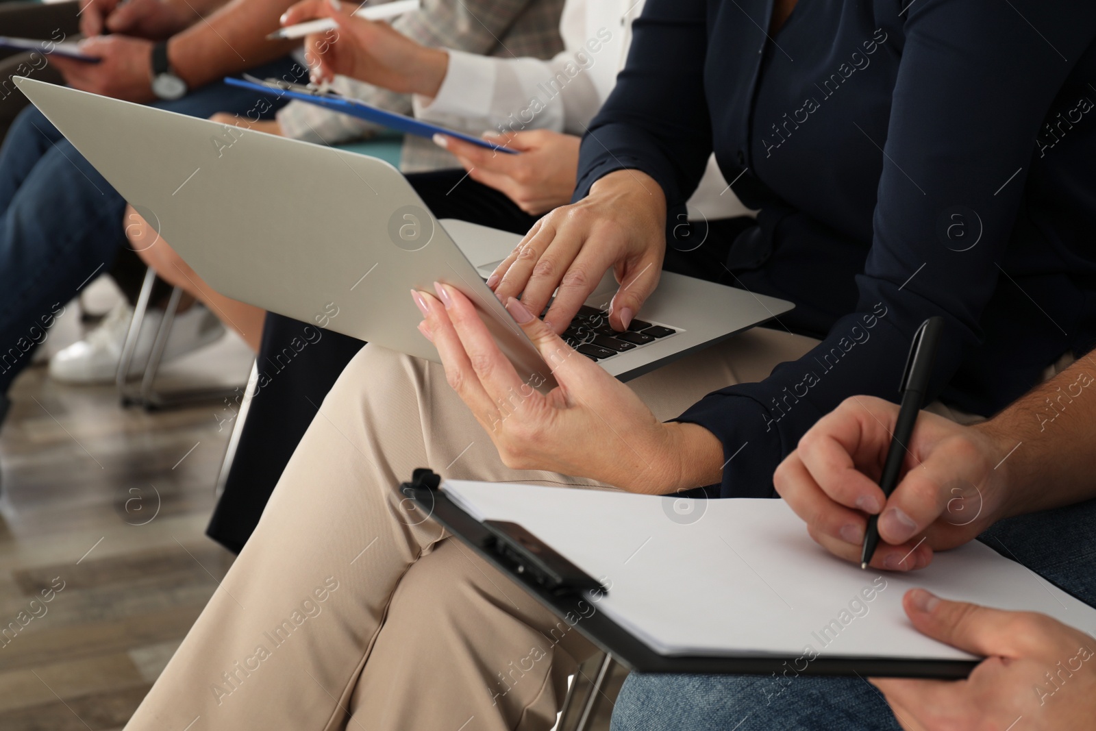 Photo of People waiting for job interview in office, closeup