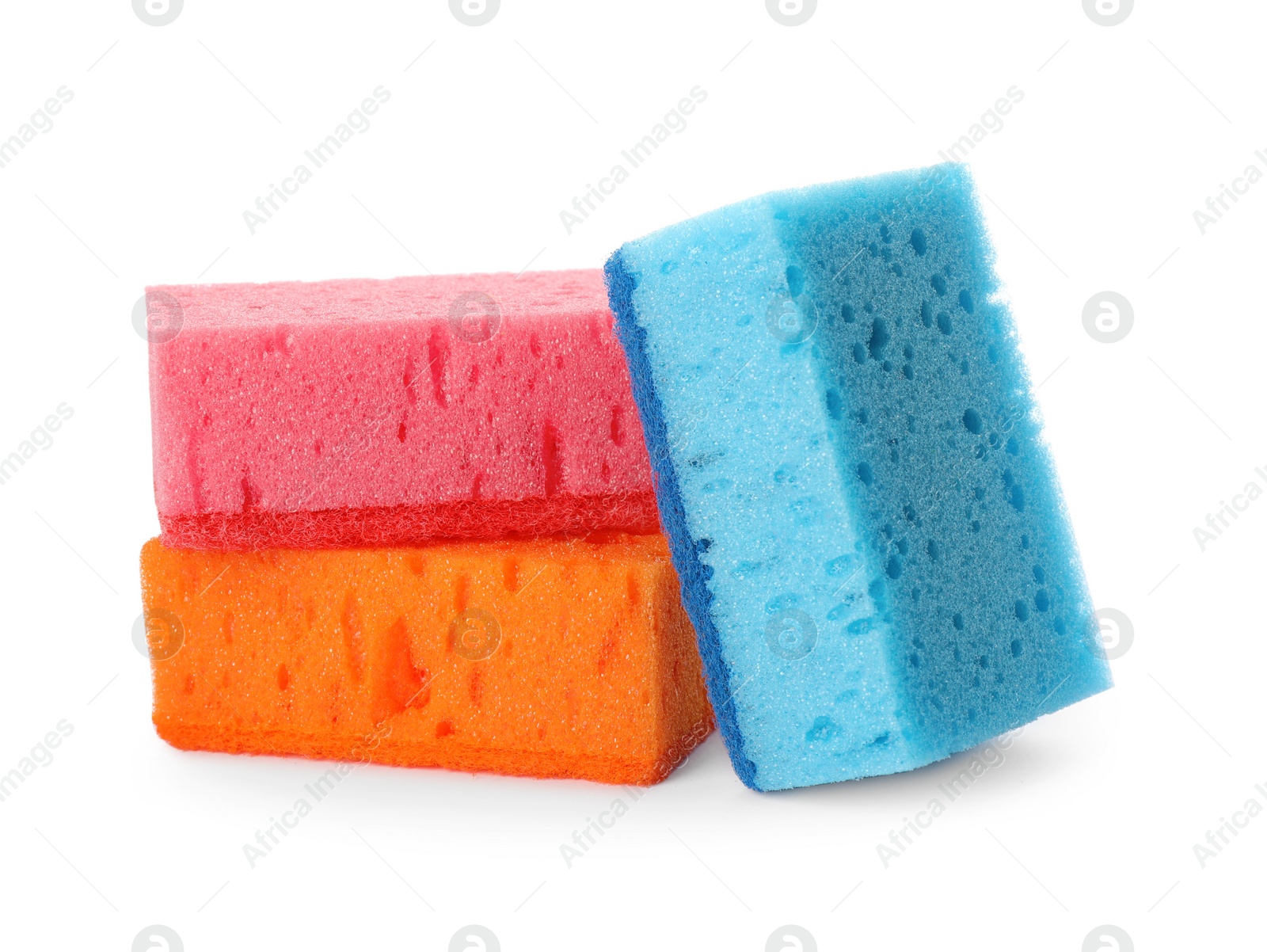 Photo of Bright cleaning sponges with abrasive scourers on white background