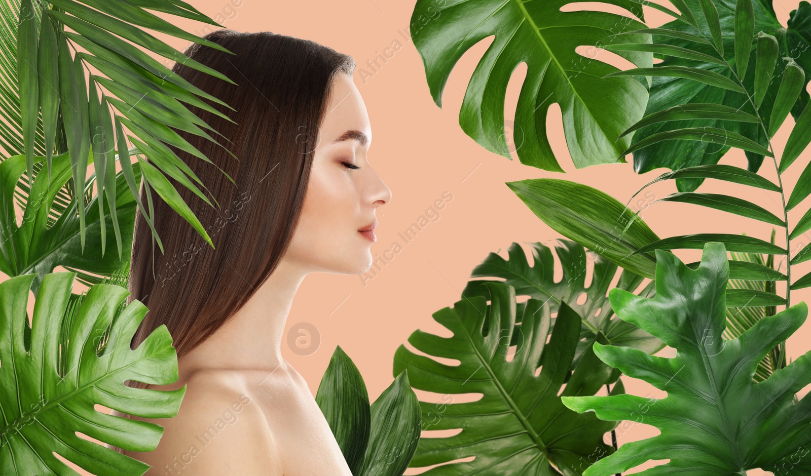 Image of Beautiful young woman and tropical leaves. Spa portrait