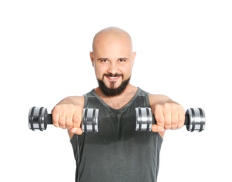 Overweight man doing exercise with dumbbells on white background