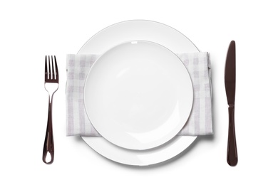 Beautiful table setting on white background, top view