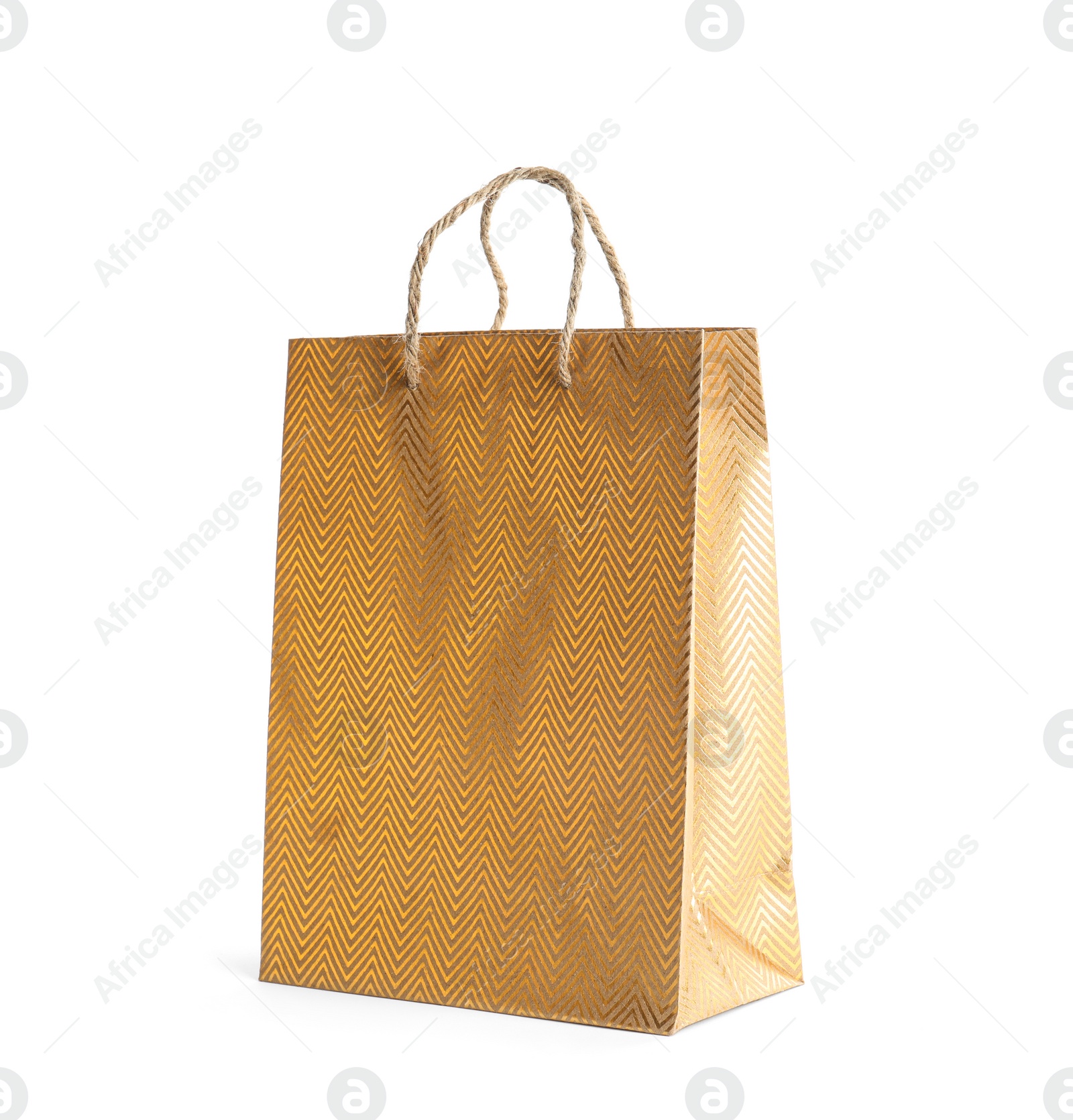 Photo of Golden paper shopping bag isolated on white. Space for design