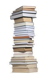 Photo of High stack of many different books isolated on white