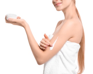 Photo of Young woman with jar of body cream on white background