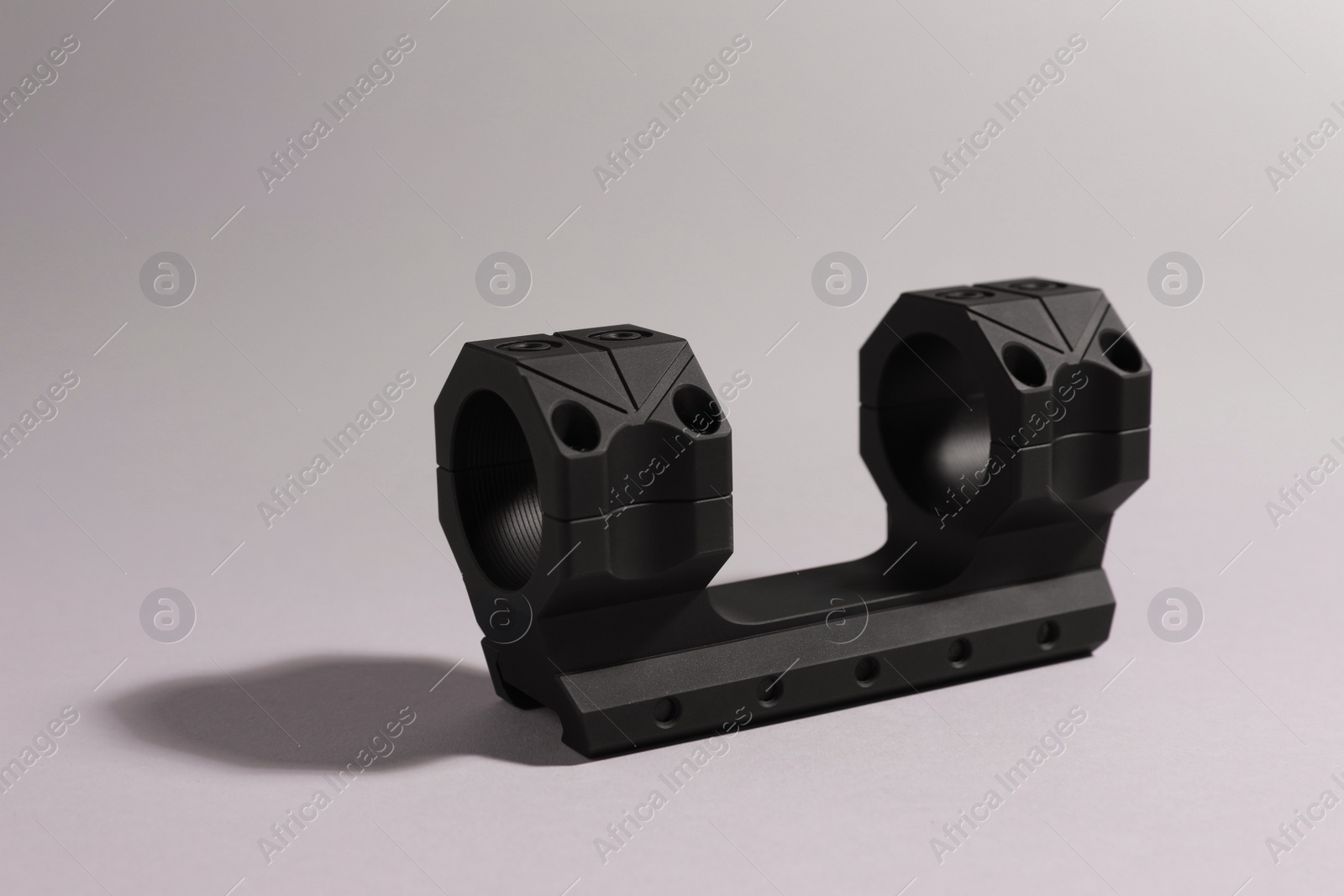 Photo of Quick disconnect sniper cantilever scope mount on grey background