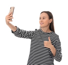 Photo of Teenage girl taking selfie on white background