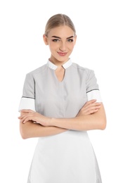 Portrait of young chambermaid in tidy uniform on white background