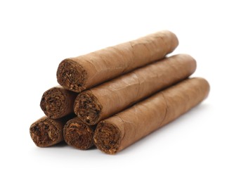 Photo of Many cigars on white background. Tobacco smoking