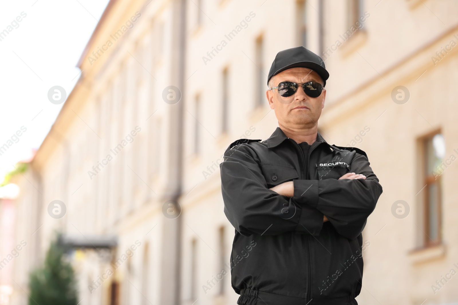 Photo of Portrait of male security guard in uniform outdoors