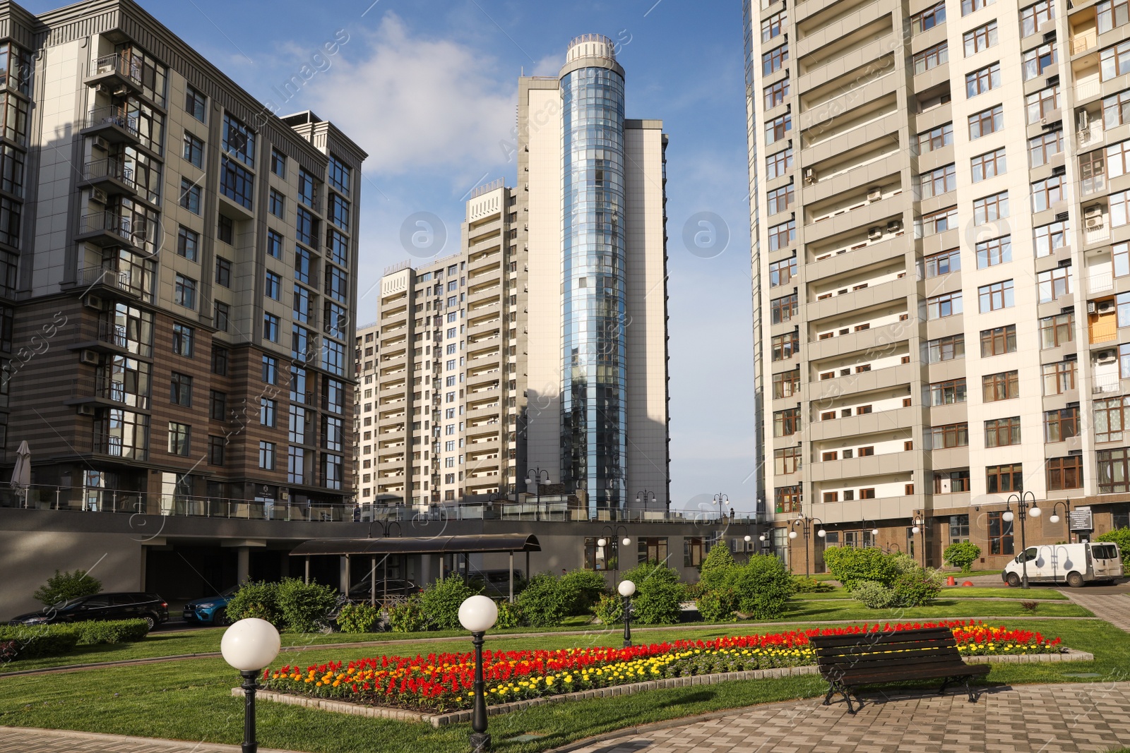 Photo of KYIV, UKRAINE - MAY 21, 2019: Beautiful view of modern housing estate in Pecherskyi district on sunny day