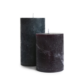 Dark aromatic decorative candles isolated on white