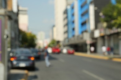 Blurred view of city street with cars
