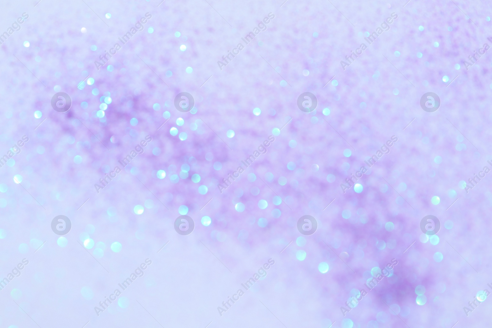 Photo of Shiny lilac background with magical bokeh effect