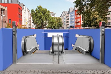 View of entrance to modern subway in city street