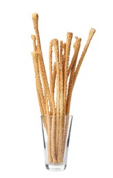 Photo of Delicious grissini sticks in glass on white background