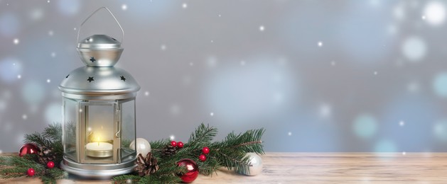 Image of Lantern and Christmas decorations on grey background, space for text. Banner design