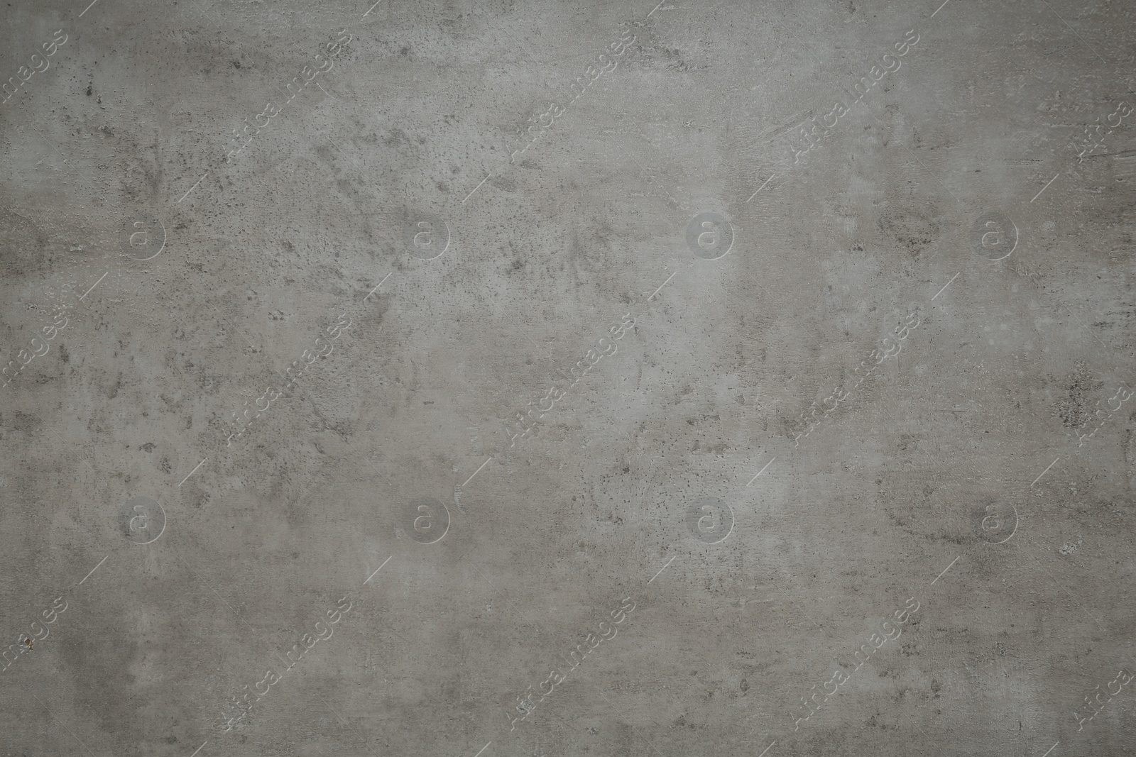 Photo of Light grey stone surface as background, top view