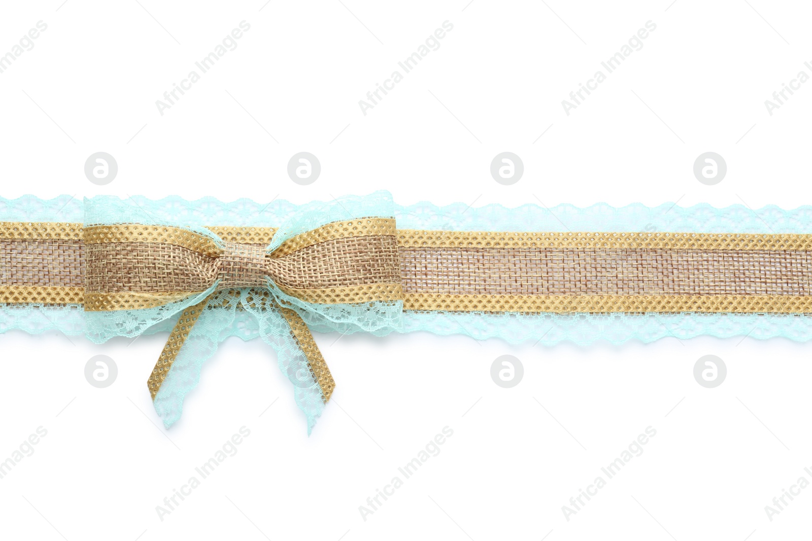 Photo of Burlap ribbon and bow with light blue lace on white background, top view