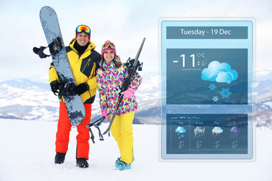 Image of Lovely couple with equipment at ski resort and weather forecast widget. Mobile application