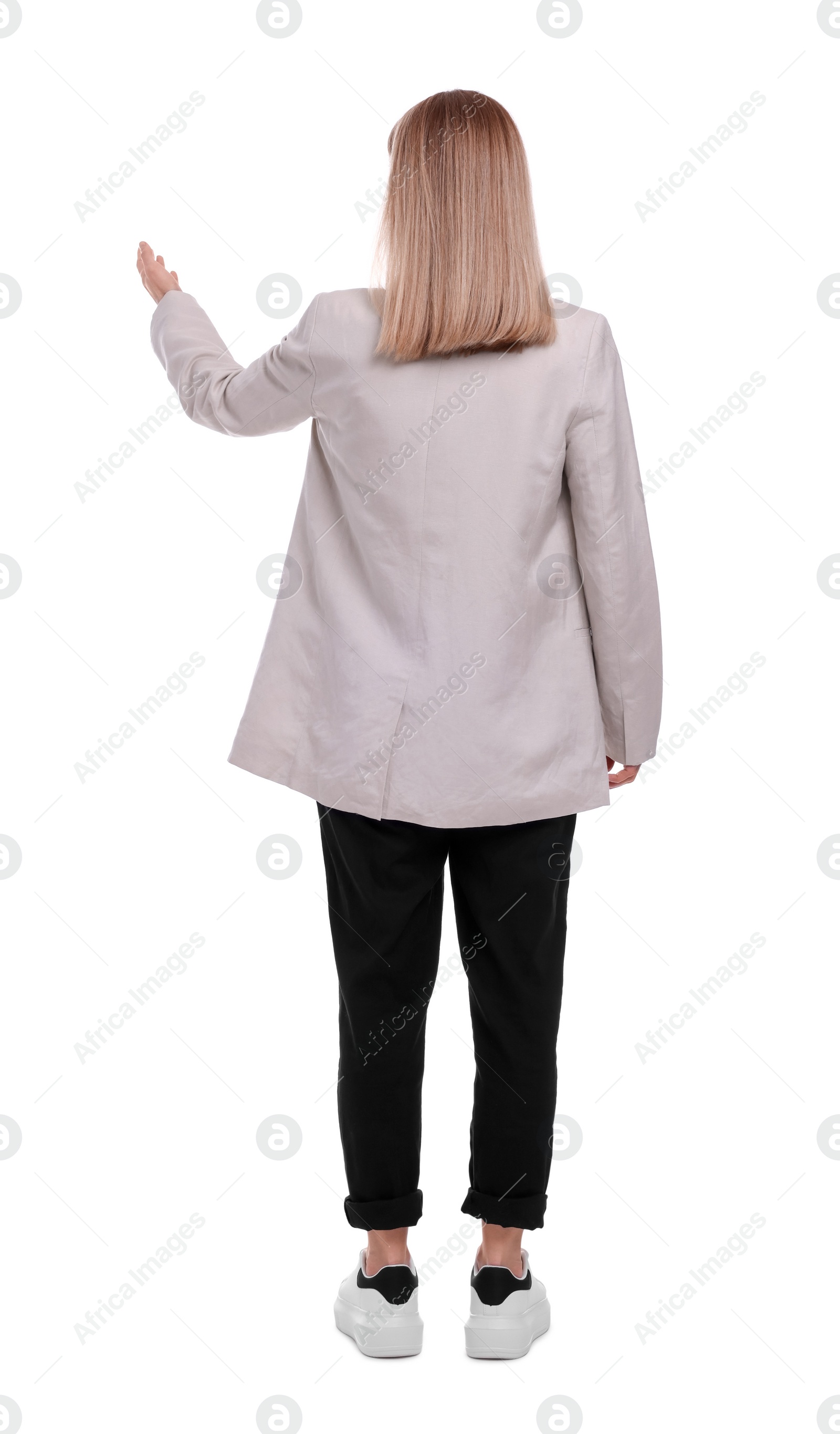 Photo of Businesswoman posing on white background, back view