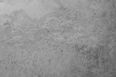 Texture of grey stone surface as background, closeup