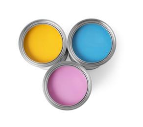 Photo of Cans with different paints on white background, top view