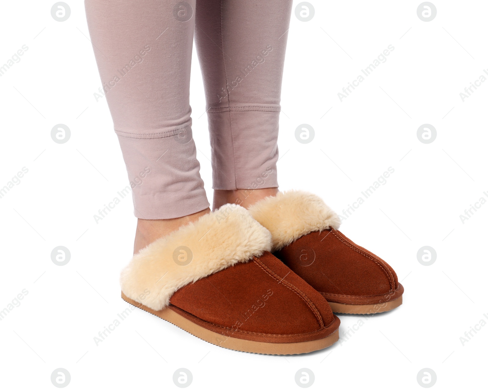 Photo of Woman in soft slippers on white background, closeup