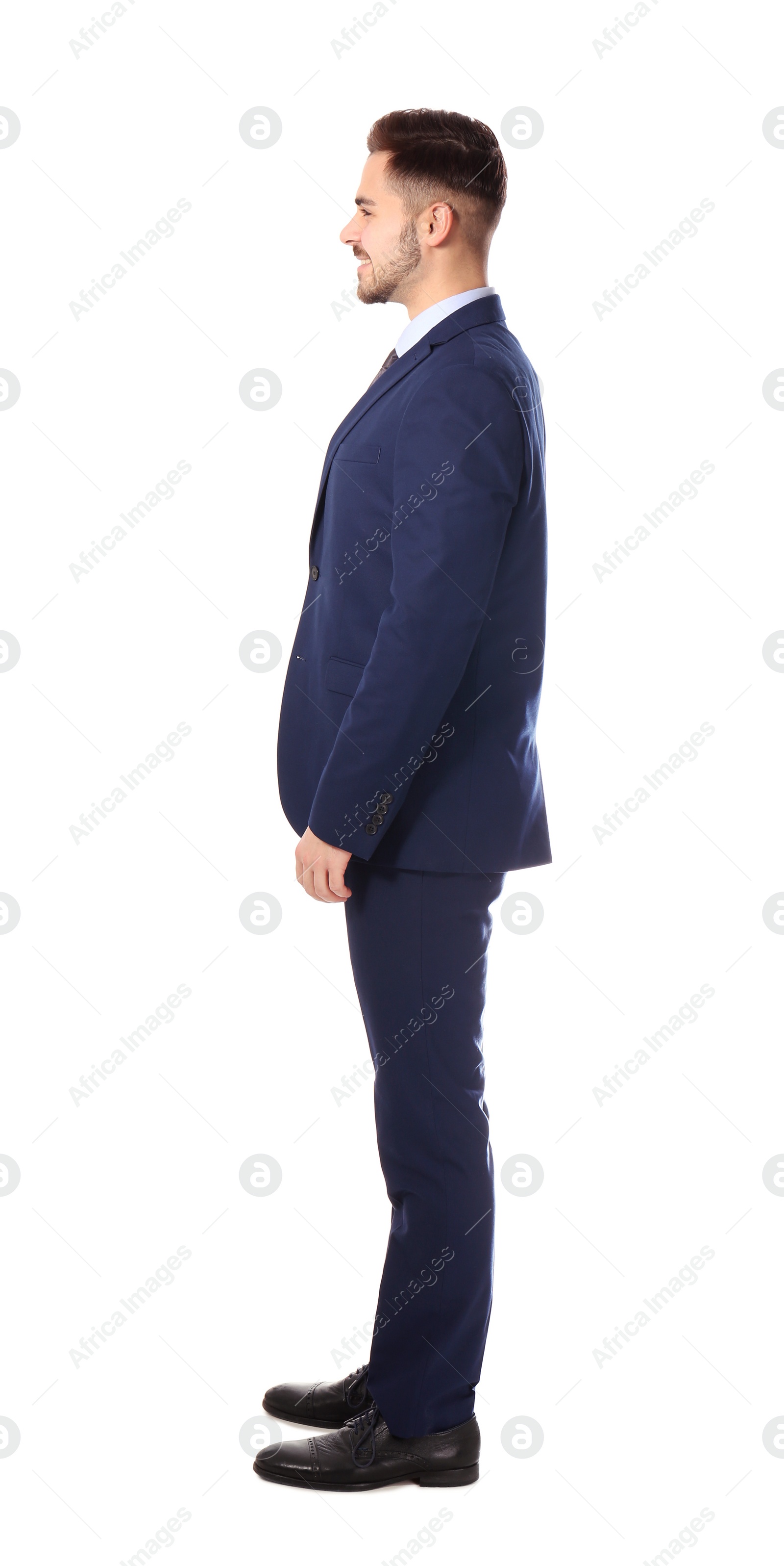 Photo of Full length portrait of businessman posing on white background