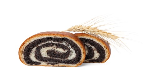 Photo of Slices of poppy seed roll and spikelet isolated on white. Tasty cake