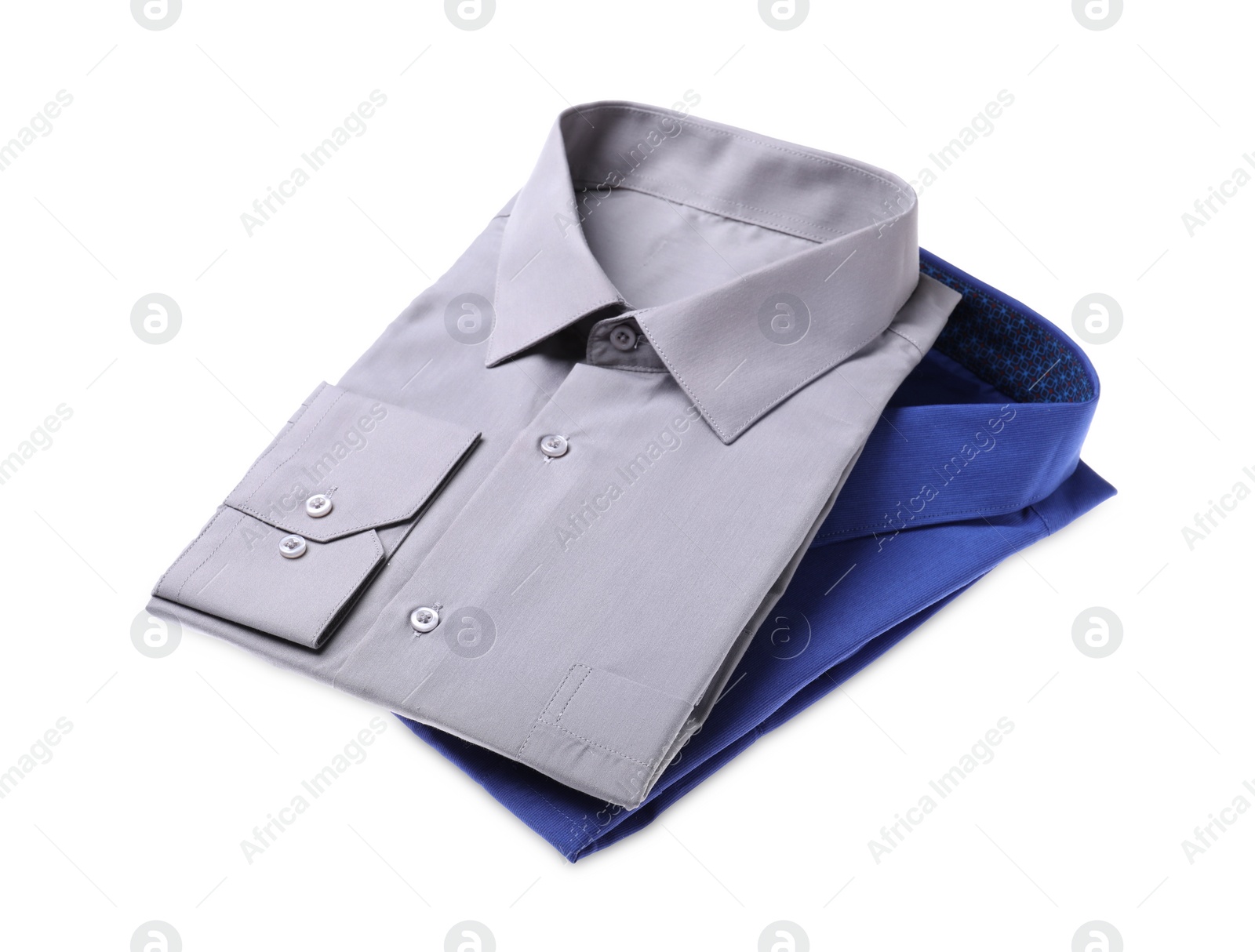 Photo of Stylish shirts isolated on white. Dry-cleaning service