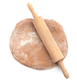 Photo of Raw rye dough and rolling pin on white background, top view