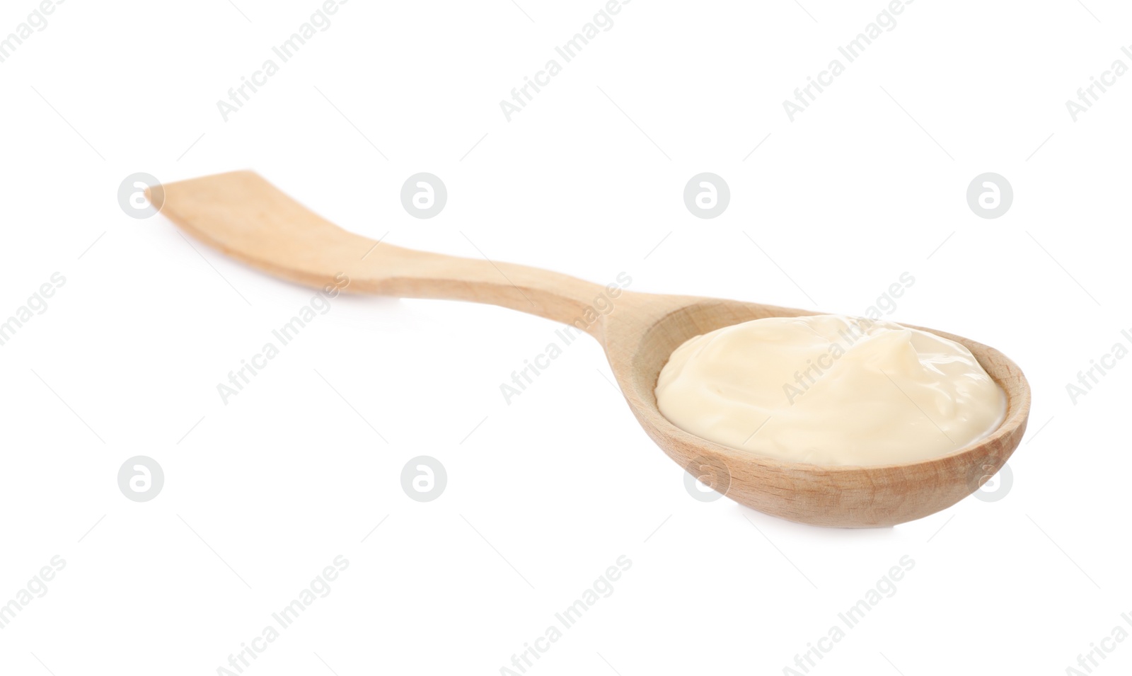 Photo of Wooden spoon with mayonnaise isolated on white