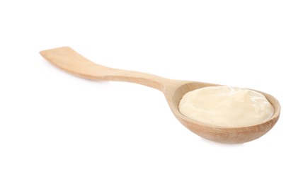 Photo of Wooden spoon with mayonnaise isolated on white