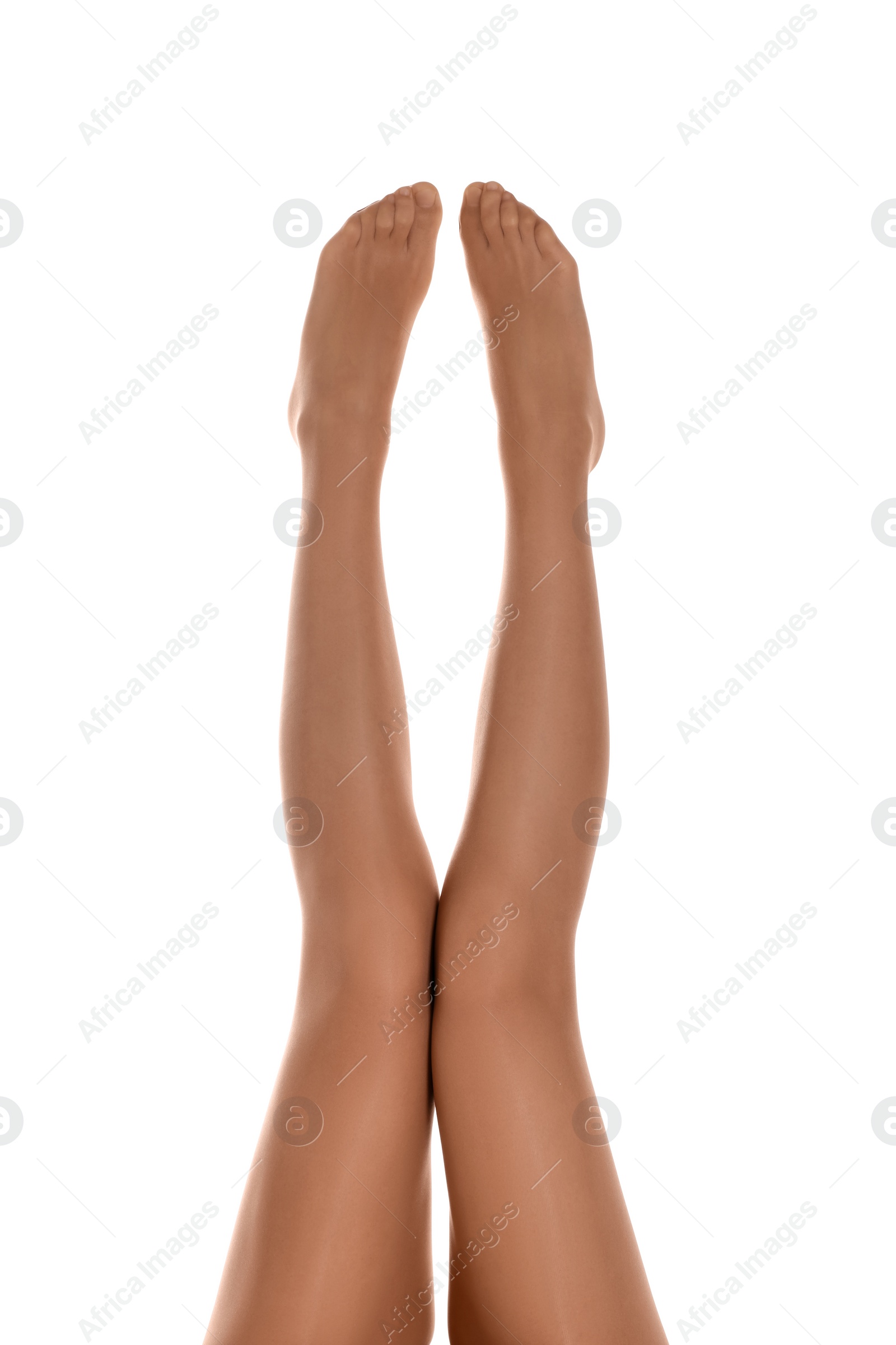 Photo of Woman with beautiful long legs wearing tights on white background, closeup