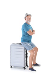 Photo of Senior man with suitcase on white background. Vacation travel