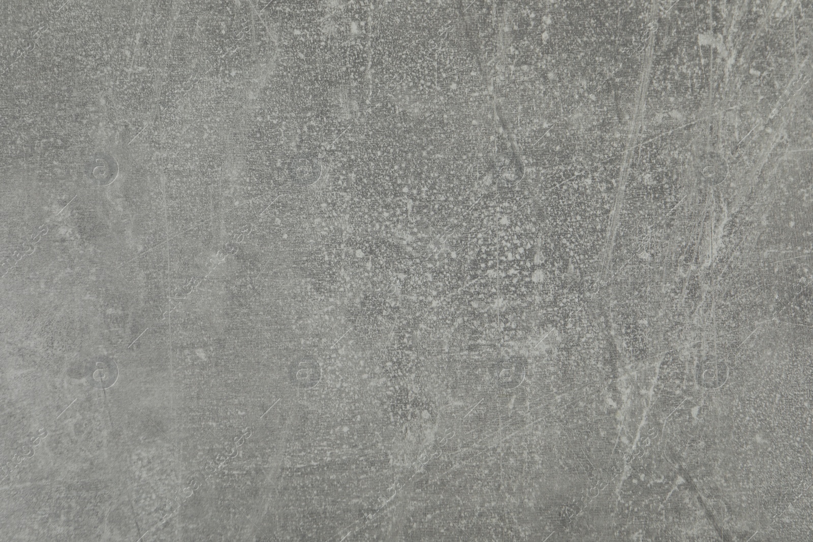 Photo of Texture of light grey stone surface as background, closeup