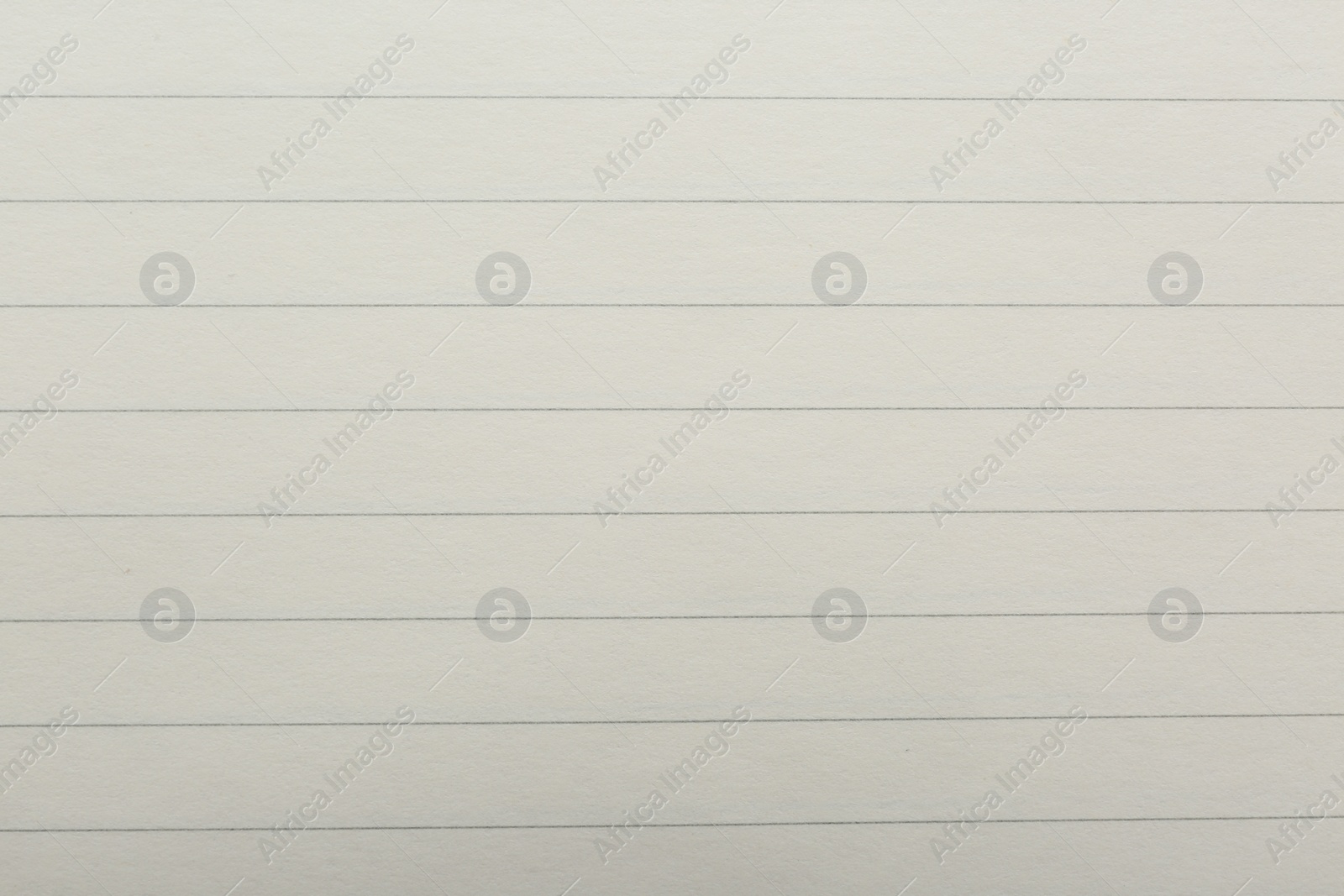 Photo of Lined notebook sheet as background, top view